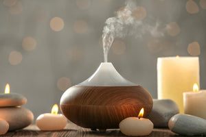 https://beyondxposure.com/cdn/shop/files/essential-oil-aromatherapy-diffuser-surrounded-by-candles_300x.jpg?v=1649629435